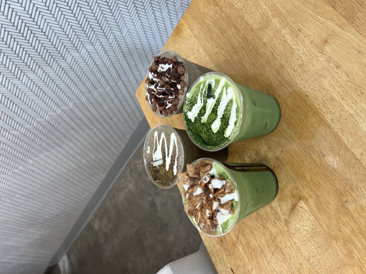 Four specialty iced drinks with matcha and toppings